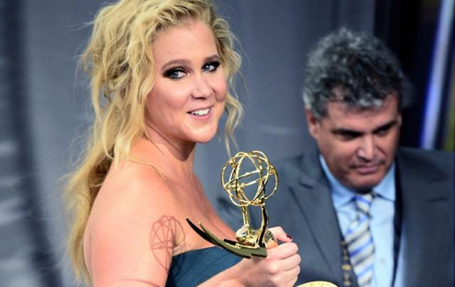 Amy Schumer, winner of the Outstanding Variety Sketch Series Award for Inside Amy Schumer, poses in the press room. (AP) Amy Schumer, winner of the Outstanding Variety Sketch Series Award for Inside Amy Schumer, poses in the press room. (AP)