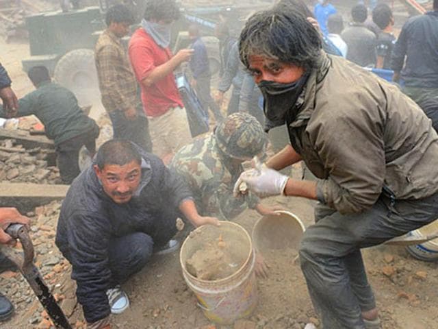 People clear rubble in Kathmandu’s Durbar Square, a UNESCO World Heritage Site that was severely damaged by the earthquake in April. (AFP File photo) People clear rubble in Kathmandu’s Durbar Square, a UNESCO World Heritage Site that was severely damaged by the earthquake in April. (AFP File photo)