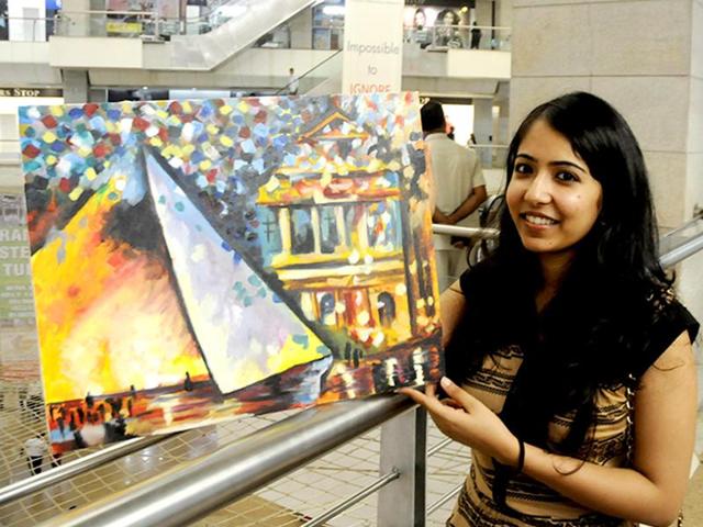 Several students of IIM-Lucknow flocked to Fun Republic Mall on Sunday and sold their paintings to help the girl child. The exercise was also aimed at helping students learn the art of negotiation. Lucknowites happily opened their wallets for amateur paintings made by budding managers. (Deepak Gupta/HT) 