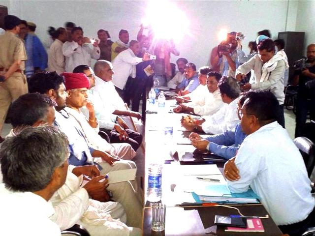 A file photo of Gujjar leader Kirori Singh Bainsla in talks with Rajasthan cabinet ministers at a meeting demanding reservation in Bharatpur district of Rajasthan. (Pti) A file photo of Gujjar leader Kirori Singh Bainsla in talks with Rajasthan cabinet ministers at a meeting demanding reservation in Bharatpur district of Rajasthan. (Pti)