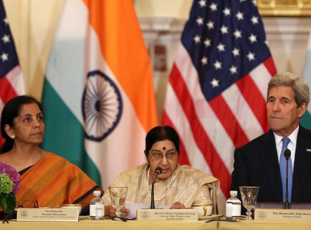 US Secretary of State John Kerry (R) listens to India's Minister of Commerce and Industry Nirmala Sitharaman (L) and External Affairs Minister Sushma Swaraj (C) at the US-India Strategic & Commercial Dialogue plenary session at the State Department in Washington September 22, 2015. (REUTERS) US Secretary of State John Kerry (R) listens to India's Minister of Commerce and Industry Nirmala Sitharaman (L) and External Affairs Minister Sushma Swaraj (C) at the US-India Strategic & Commercial Dialogue plenary session at the State Department in Washington September 22, 2015. (REUTERS)