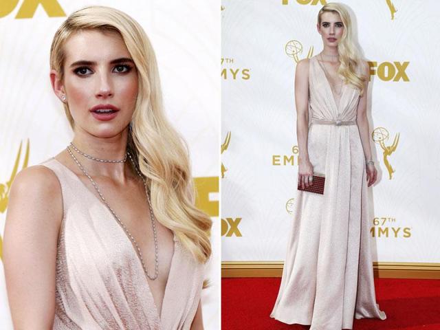 Actor Emma Roberts channelled pure Hollywood vibes with her wavy blonde hair and dark red pout. (AGENcies)