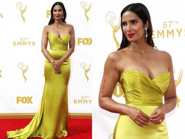 Only Padma Lakshmi can pull off silky citrine on satin like that. The Top Chef judge didn’t refrain from showing off her glorious body at the red carpet to the cameras (AGENcies)