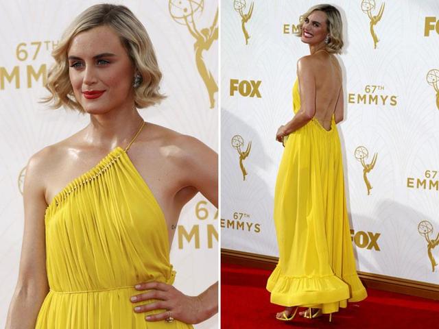 Orange is the New Black star Taylor Schilling brought a dash of colour to the red carpet with her bright yellow dress. (AGENcies)