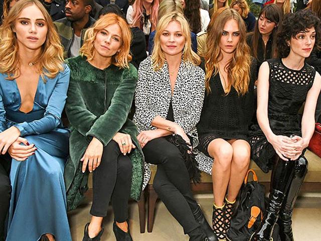 Golden-haired princesses Suki Waterhouse, Sienna Miller, Kate Moss and Cara Delevingne sat on their front-row throne-benches at Burberry Prorsum show. 