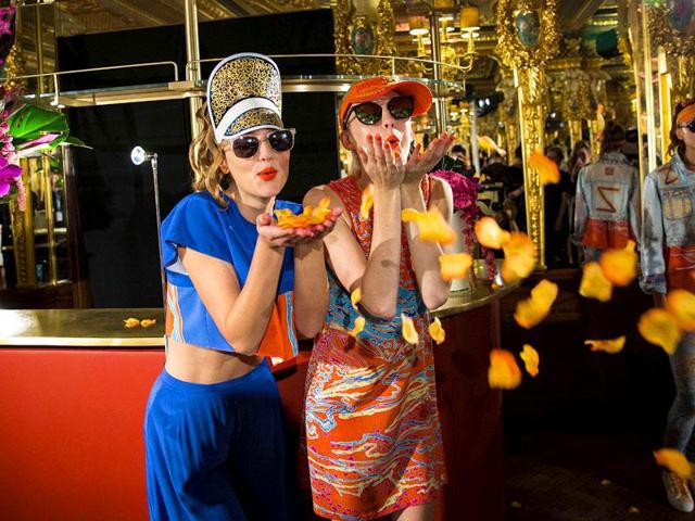 Zandra Rhodes’s collection was divided into two colour palettes - pink (hot pinks to baby pastels), and royal blue cut through with bright orange. 