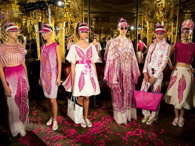 Zandra Rhodes collection was a melange of candy tones, from the tip of the sheer visors to the petals strewn around the models’ toes. 