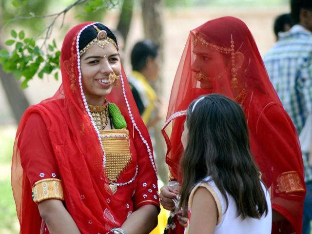 Women of the Bishnoi community at a festival near Jodhpur. The strengthening of regressive attitudes is occurring at a time when women are desperate to work.(PTI/ REPRESENTATIVE PHOTO) Women of the Bishnoi community at a festival near Jodhpur. The strengthening of regressive attitudes is occurring at a time when women are desperate to work.(PTI/ REPRESENTATIVE PHOTO)