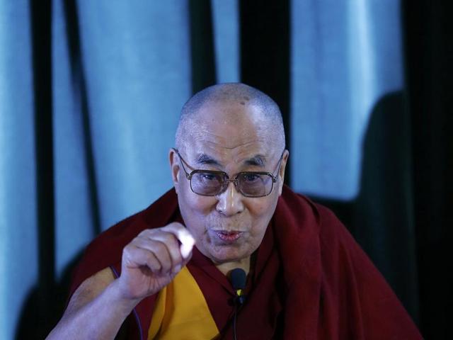 Tibetan spiritual leader, the Dalai Lama speaks during a news conference at Magdalene College in Oxford, Britain(REUTERS)