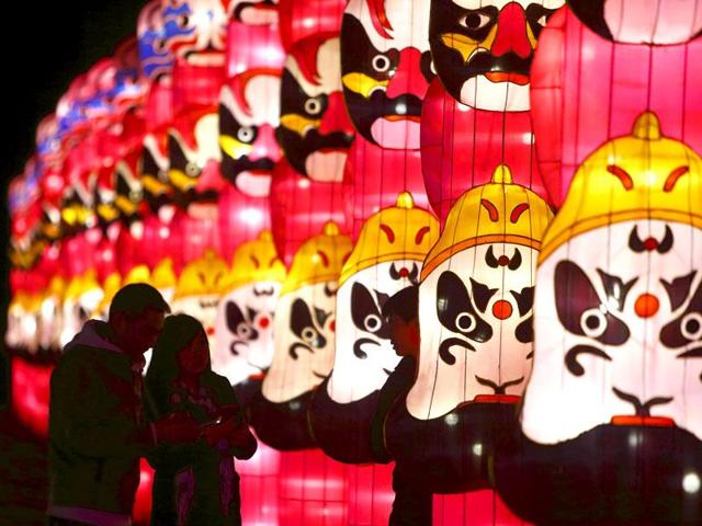 People attend the Dandenong Festival of Lights in the suburb of Dandenong in Melbourne. (Reuters)