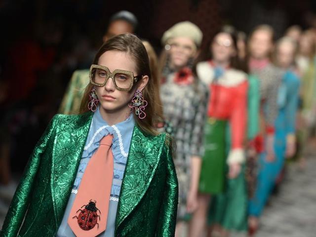 Models present creations for fashion house Gucci during the women Spring / Summer 2016 Milan's Fashion Week in Milan. (AFP) Models present creations for fashion house Gucci during the women Spring / Summer 2016 Milan's Fashion Week in Milan. (AFP)