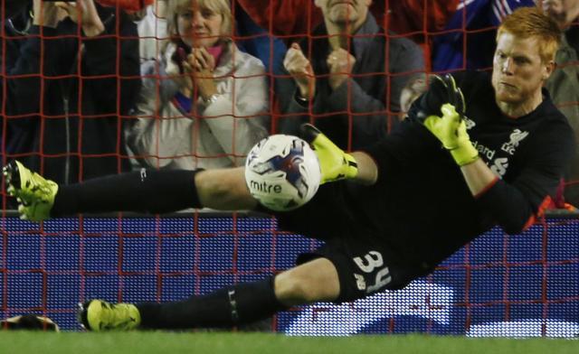 Liverpool goalkeeper Adam Bogdan saves a penalty from Carlisle's Bastien Hery to win the penalty shootout. (Reuters Photo) Liverpool goalkeeper Adam Bogdan saves a penalty from Carlisle's Bastien Hery to win the penalty shootout. (Reuters Photo)