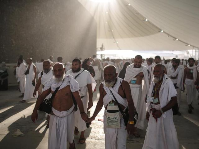 Muslim pilgrims during a ritual “Jamarat” - the last rite of the annual haj - in which they cast stones at a pillar to symbolize the stoning of Satan, on the first day of Eid al-Adha, in Mina near Mecca, Saudi Arabia. (AP)