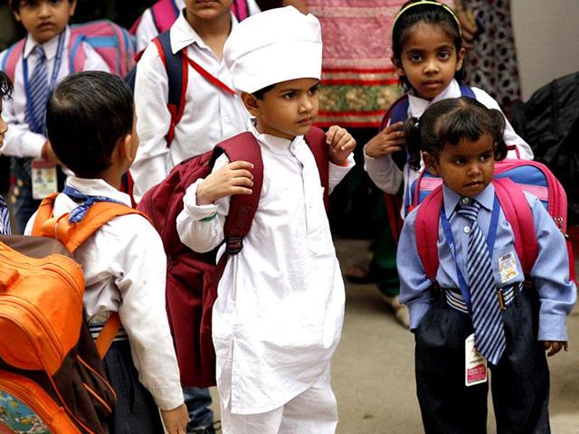 Students wear full sleeves as a precaution against dengue at a school in New Delhi. (Arun Sharma/ HT Photo)