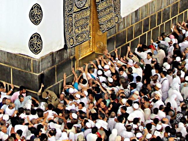 Muslim pilgrims touch the Kaaba door as they circumvent around it at the Masjid al-Haram Mosque, Islam's holiest site, two days before the Haj pilgrimage, in Mecca. (EPA Photo) Muslim pilgrims touch the Kaaba door as they circumvent around it at the Masjid al-Haram Mosque, Islam's holiest site, two days before the Haj pilgrimage, in Mecca. (EPA Photo)