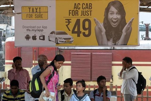 A TaxiForSure advertisement at a bus stop. (Livemint Photo) A TaxiForSure advertisement at a bus stop. (Livemint Photo)