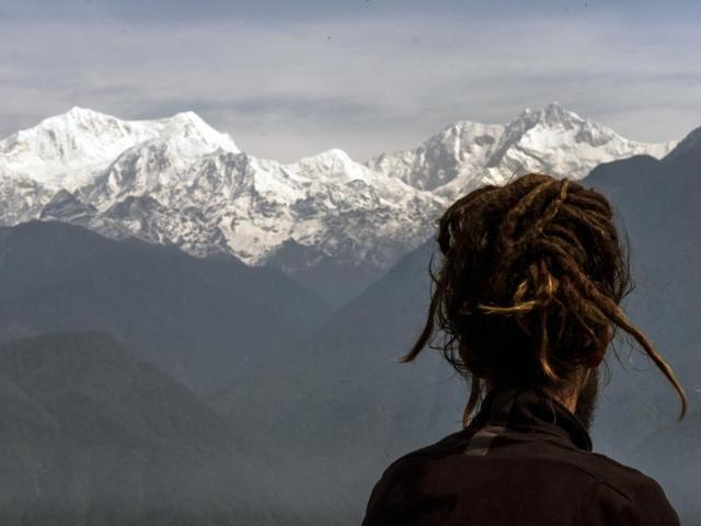 Kanev looks over at the Kangchenjunga peak from Pelling, Sikkim (Photo: Roving Snails)