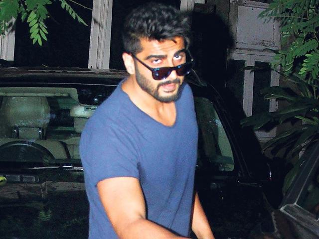 Arjun Kapoor outisde R Balki’s office on Friday night. And though it was dark, he actors sported sun glares. (Photo: Yogen Shah)