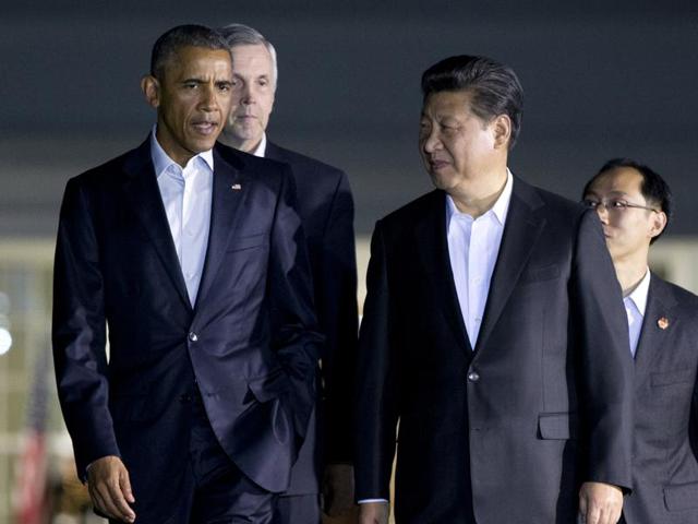 US President Barack Obama (L) chats with Chinese President Xi Jinping as they walk from the West Wing of the White House to a private dinner across the street at Blair House, in Washington. (Reuters Photo) US President Barack Obama (L) chats with Chinese President Xi Jinping as they walk from the West Wing of the White House to a private dinner across the street at Blair House, in Washington. (Reuters Photo)