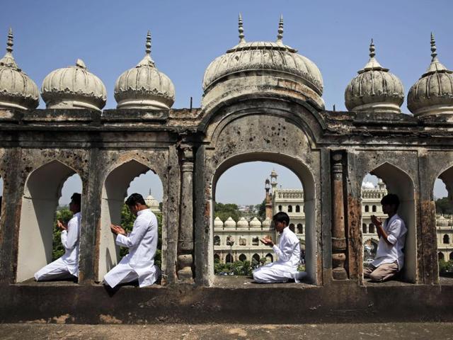 Indian Muslims offer prayers to mark Eid al-Adha at Bara Imambara in Lucknow, India, Friday. (AP)