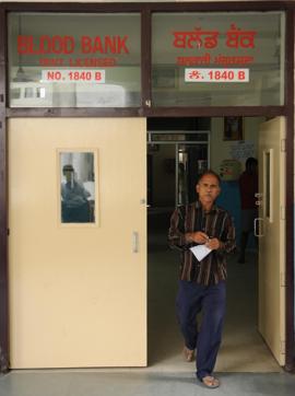 A person walks out of blood bank in civil hospital in Jalandhar on Friday. (Pardeep Pandit/HT Photo) A person walks out of blood bank in civil hospital in Jalandhar on Friday. (Pardeep Pandit/HT Photo)