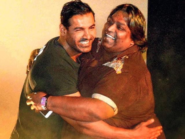John Abraham and Ganesh Acharya share a light moment at a music event for Welcome Back. (Photo: Yogen Shah)