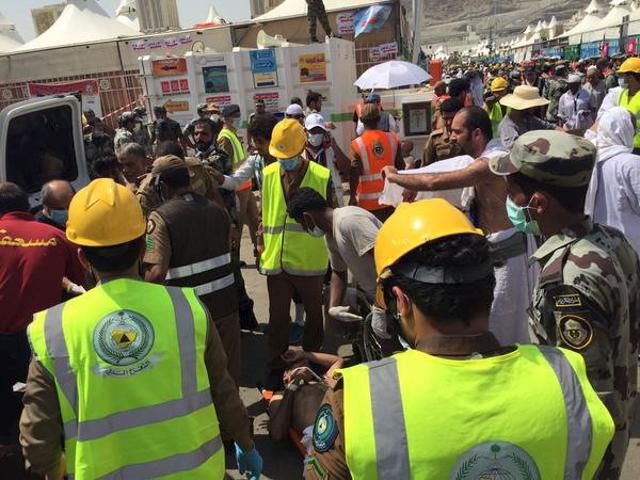 Members of Saudi civil defense try to rescue pilgrims following a crush caused by large numbers of people pushing at Mina, outside the Muslim holy city of Mecca in this handout picture published on Twitter account of the Directorate of the Saudi Civil Defense. Members of Saudi civil defense try to rescue pilgrims following a crush caused by large numbers of people pushing at Mina, outside the Muslim holy city of Mecca in this handout picture published on Twitter account of the Directorate of the Saudi Civil Defense.