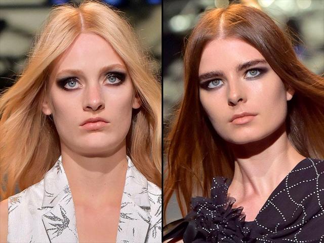 Costume National stayed true to its minimalistic aesthetic with a graphic, linear cat eye standing out against a nude lip. (AFP)