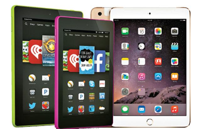 Stiff competition: With its unbelievable pricing, the Amazon Fire Tablets (above, left) may hit out not just at the iPad Mini (above, right) or the iPad, but at all Tablet makers.