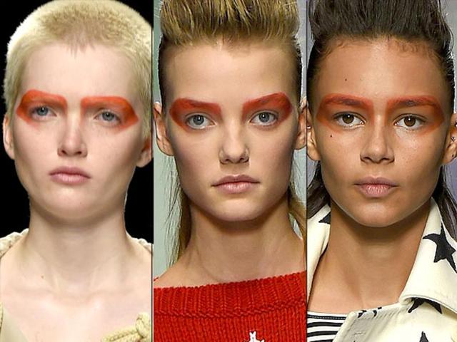 Max Mara injected color into its show with these bold brows in striking hues, stretching down to hit the cheekbone. (AFP)