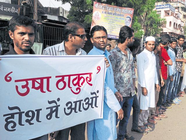Muslims staged a demonstration at Regal crossing in Indore on Saturday to protest against BJP MLA Usha Thakur's statement on Eid-ul-Zuha. (Shankar Mourya/HT photo) Muslims staged a demonstration at Regal crossing in Indore on Saturday to protest against BJP MLA Usha Thakur's statement on Eid-ul-Zuha. (Shankar Mourya/HT photo)