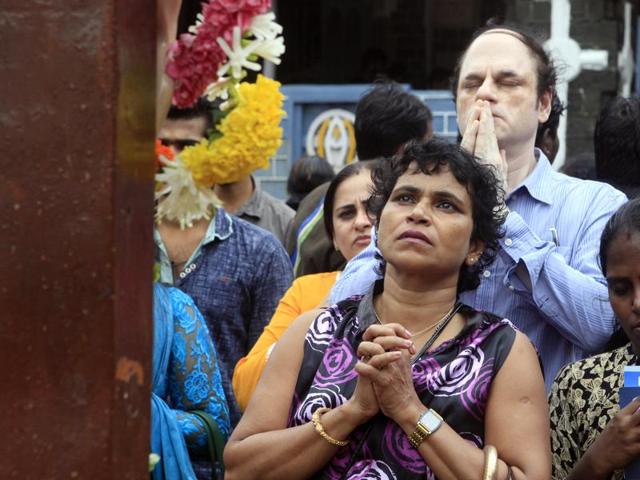 People visit the Mount Mary church on the last day of fair at Bandra in Mumbai. (Pratham Gokhale/HT photo)