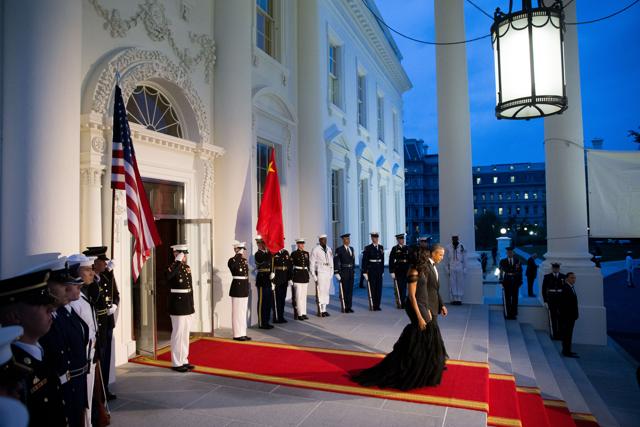 President Barack Obama and first lady Michelle Obama arrive to greet Chinese President Xi Jinping and his wife Peng Liyuan for a State Dinner, on the North Portico of the White House in Washington. (AP Photo) President Barack Obama and first lady Michelle Obama arrive to greet Chinese President Xi Jinping and his wife Peng Liyuan for a State Dinner, on the North Portico of the White House in Washington. (AP Photo)