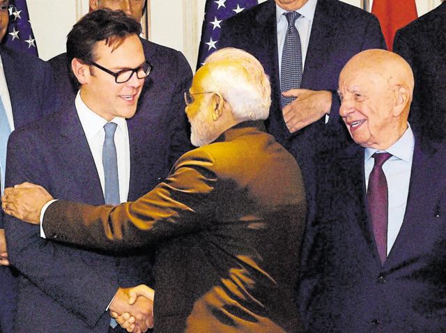 PM Narendra Modi with media mogul Rupert Murdoch (right) and his son James before a roundtable in New York on Thursday. “Great hour with Indian PM Modi. Best leader with best policies since independence, but massive task to achieve in most complex nation,” the 84-year-old News Corp chief tweeted. (PTI) PM Narendra Modi with media mogul Rupert Murdoch (right) and his son James before a roundtable in New York on Thursday. “Great hour with Indian PM Modi. Best leader with best policies since independence, but massive task to achieve in most complex nation,” the 84-year-old News Corp chief tweeted. (PTI)