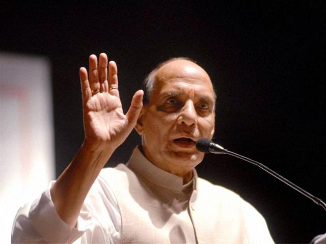File photo of Union home minister Rajnath Singh addressing a conference in Pune. Singh has said that government was not giving report card to the RSS.(PTI)