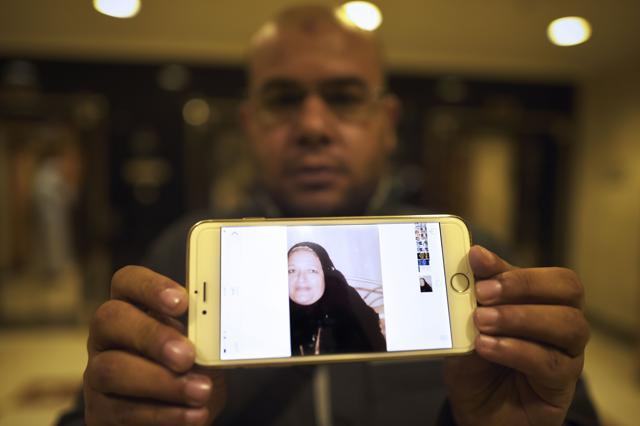The relative of a missing pilgrim shows her picture as he searches in an emergency hospital following a deadly stampede in Mina, near the holy city of Mecca, late on September 25, 2015. (AFP Photo) The relative of a missing pilgrim shows her picture as he searches in an emergency hospital following a deadly stampede in Mina, near the holy city of Mecca, late on September 25, 2015. (AFP Photo)