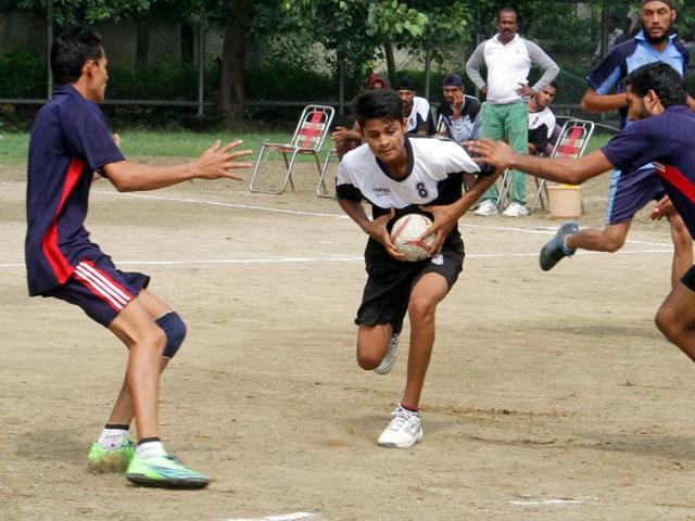 A handball match in progress between Ferozepur and Patiala on the first day of Punjab Super League at Guru Nanak stadium in Ludhiana on Saturday. (JS Grewal/HT Photo) A handball match in progress between Ferozepur and Patiala on the first day of Punjab Super League at Guru Nanak stadium in Ludhiana on Saturday. (JS Grewal/HT Photo)