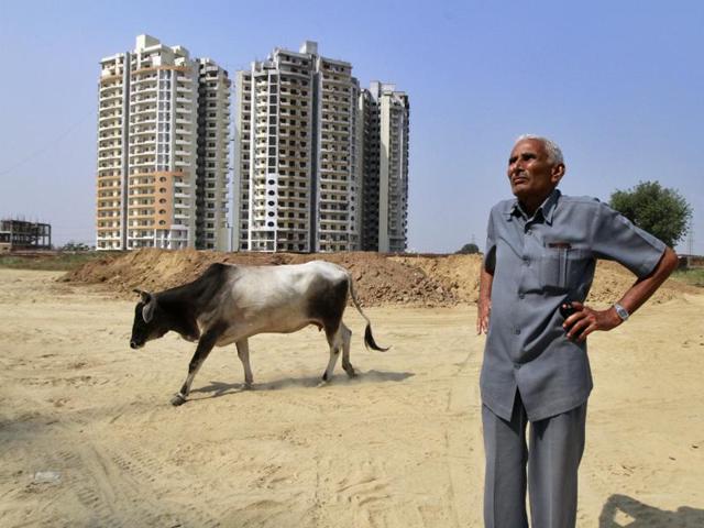 Farmers in the National Capital Region and beyond are using a section of the 2013 Land law to claim back their unused land from the state, and to demand fair compensation . In this photo, Jai Narayan, a farmer from Faridabad shows his land. (HT Photo/ Sanjeev Verma) Farmers in the National Capital Region and beyond are using a section of the 2013 Land law to claim back their unused land from the state, and to demand fair compensation . In this photo, Jai Narayan, a farmer from Faridabad shows his land. (HT Photo/ Sanjeev Verma)