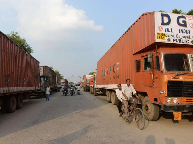 Nepalese and Indian trucks park near the Nepal-India border at Birgunj. Nepal imposed nationwide restrictions on vehicle use on growing fears of a fuel shortage. (AFP) Nepalese and Indian trucks park near the Nepal-India border at Birgunj. Nepal imposed nationwide restrictions on vehicle use on growing fears of a fuel shortage. (AFP)