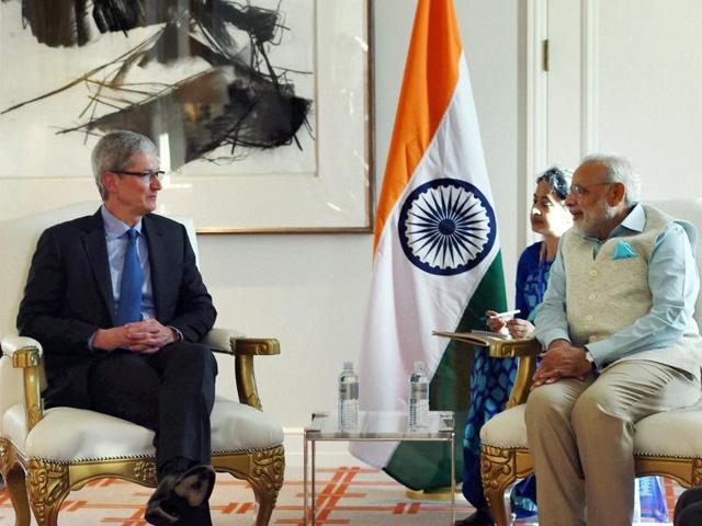 Prime Minister Narendra Modi with Tim Cook, CEO Apple Inc. at a meeting in San Jose on Saturday. (PTI Photo)