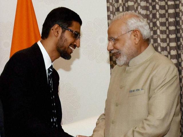 Prime Minister Narendra Modi shakes hands with Google CEO Sundar Pichai at a meeting in San Jose on Saturday. (PTI Photo)