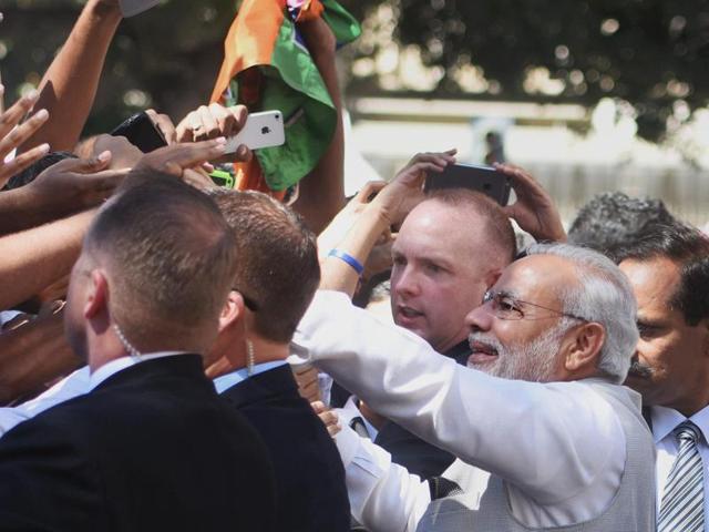 Prime Minister Narendra Modi is welcomed by Indian community people on his arrival at Norman Y. Mineta San José International Airport on Saturday. (PTI Photo)