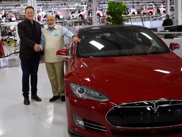 Prime Minister Narendra Modi with Elon Reeve Musk, CEO and Product Architect of Tesla Motors during a visit of TESLA motors facility in San Jose on Saturday. (PTI Photo)