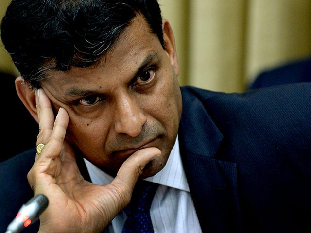 Reserve Bank of India governor Raghuram Rajan may cut interest rate with a view to spur economic recovery when he announces the bi-monthly monetary policy review of this fiscal on September 29, 2015. (AFP File Photo) Reserve Bank of India governor Raghuram Rajan may cut interest rate with a view to spur economic recovery when he announces the bi-monthly monetary policy review of this fiscal on September 29, 2015. (AFP File Photo)