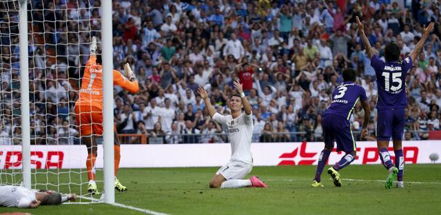 Real Madrid's Cristiano Ronaldo reacts during their La Liga match against Malaga at Santiago Bernabeu stadium in Madrid on September 26, 2015. (REUTERS) Real Madrid's Cristiano Ronaldo reacts during their La Liga match against Malaga at Santiago Bernabeu stadium in Madrid on September 26, 2015. (REUTERS)