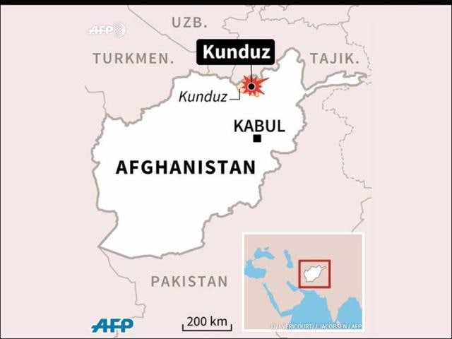 Afghan soldiers keep watch during a battle with the Taliban in Kunduz province. (REUTERS) Afghan soldiers keep watch during a battle with the Taliban in Kunduz province. (REUTERS)