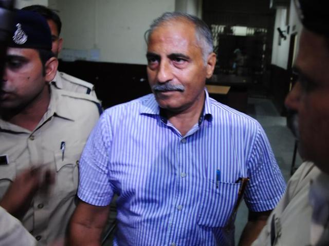 Ex-IAS officer Arvind Joshi was sent to judicial custody in the disproportionate assets case in Bhopal on Tuesday. ((Mujeeb Faruqui/HT)) Ex-IAS officer Arvind Joshi was sent to judicial custody in the disproportionate assets case in Bhopal on Tuesday. ((Mujeeb Faruqui/HT))