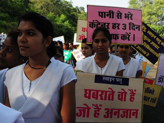 Girls take part in a health rally taken out to create awareness about swine flu and dengue in Bhopal on Sunday. ((Mujeeb Faruqui/HT photo)) Girls take part in a health rally taken out to create awareness about swine flu and dengue in Bhopal on Sunday. ((Mujeeb Faruqui/HT photo))
