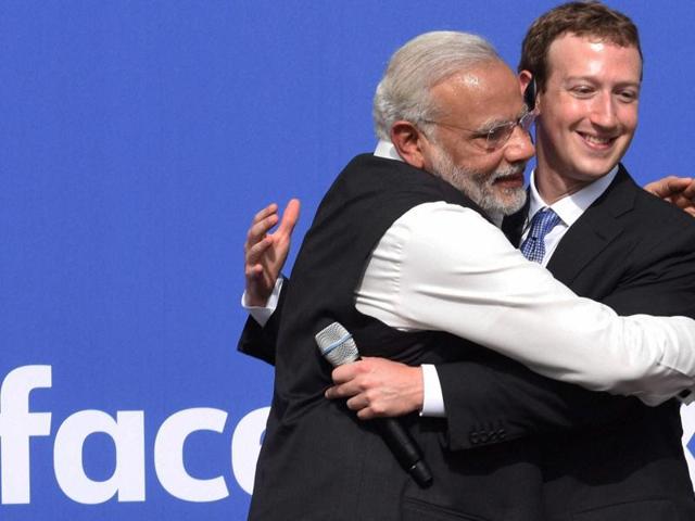 Prime Minister Narendra Modi hugs CEO of Facebook, Mark Zuckerberg at Facebook headquarters in California on Sunday. (PTI Photo)