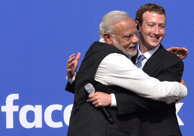 PM Modi hugs Facebook CEO Mark Zuckerberg at the Facebook headquarters in California on Sunday. (PTI)